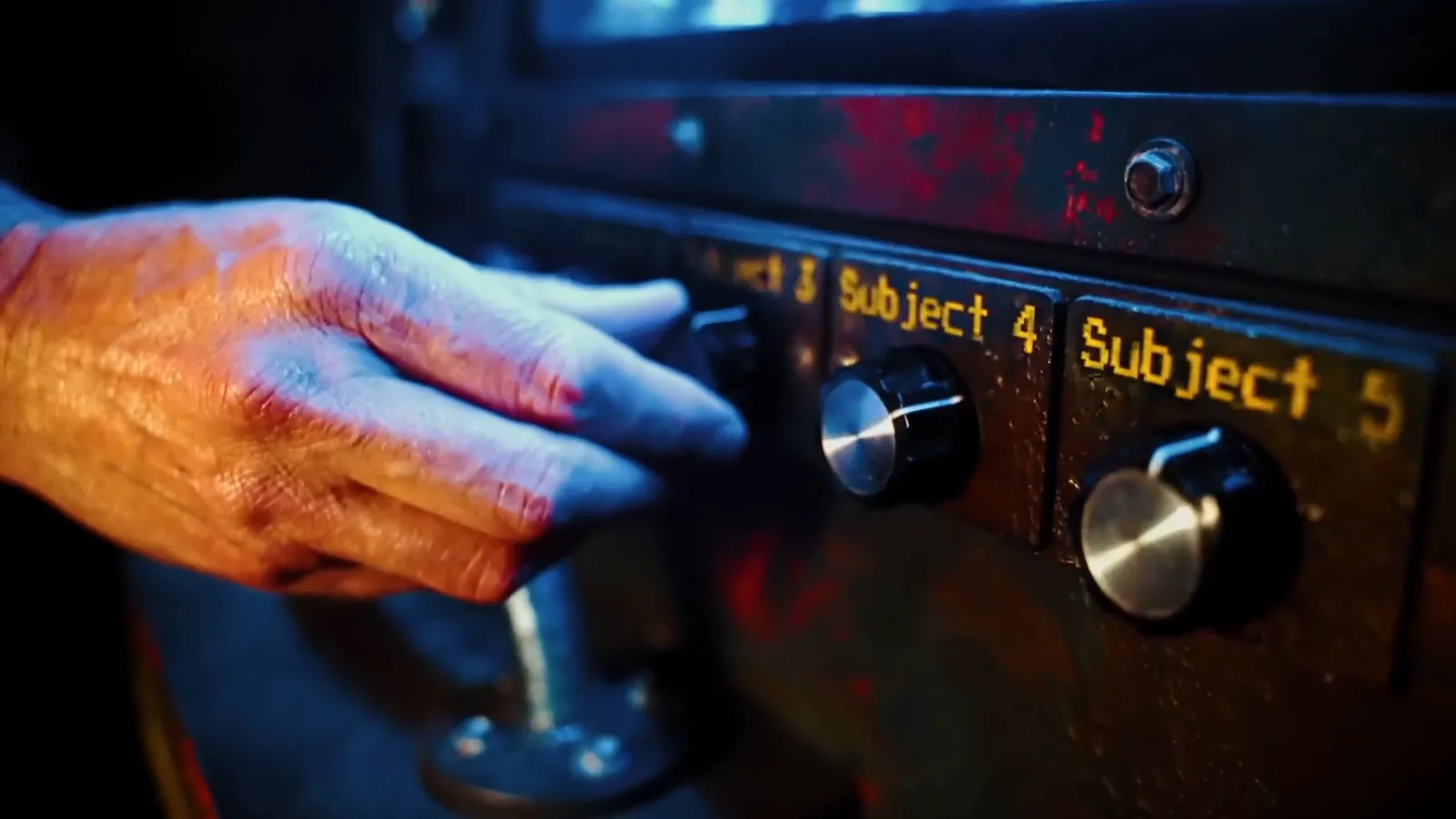 A hand turning the subject dials on a lab console in Zombie Apocalypse
